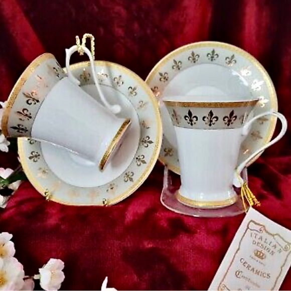 Italian design 4 piece tea cup set new in box.